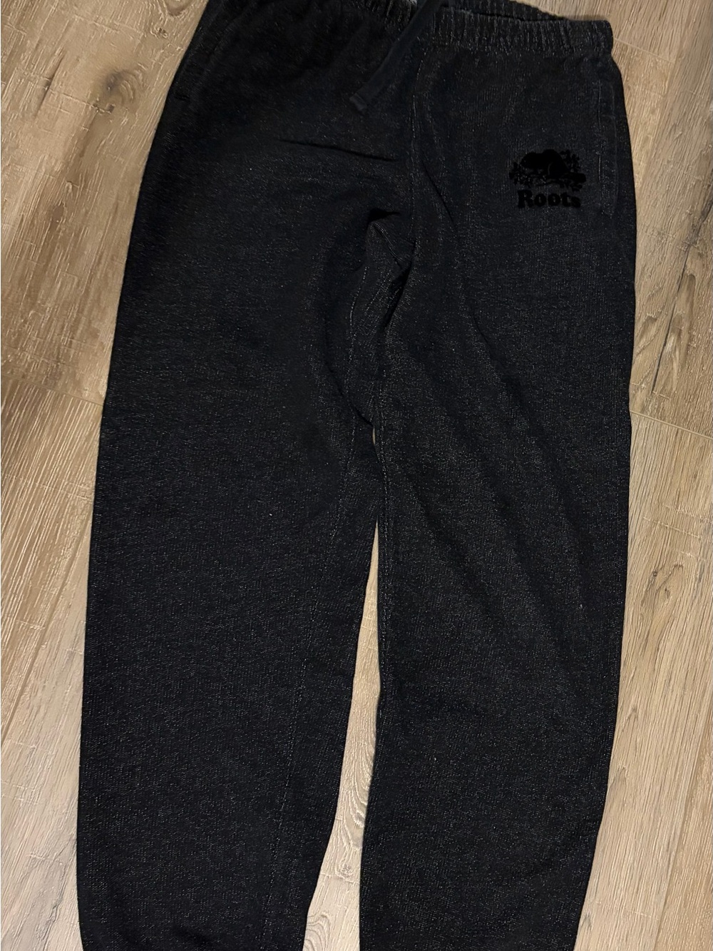 Roots ladies Black Joggers with Logo on bottom, size small